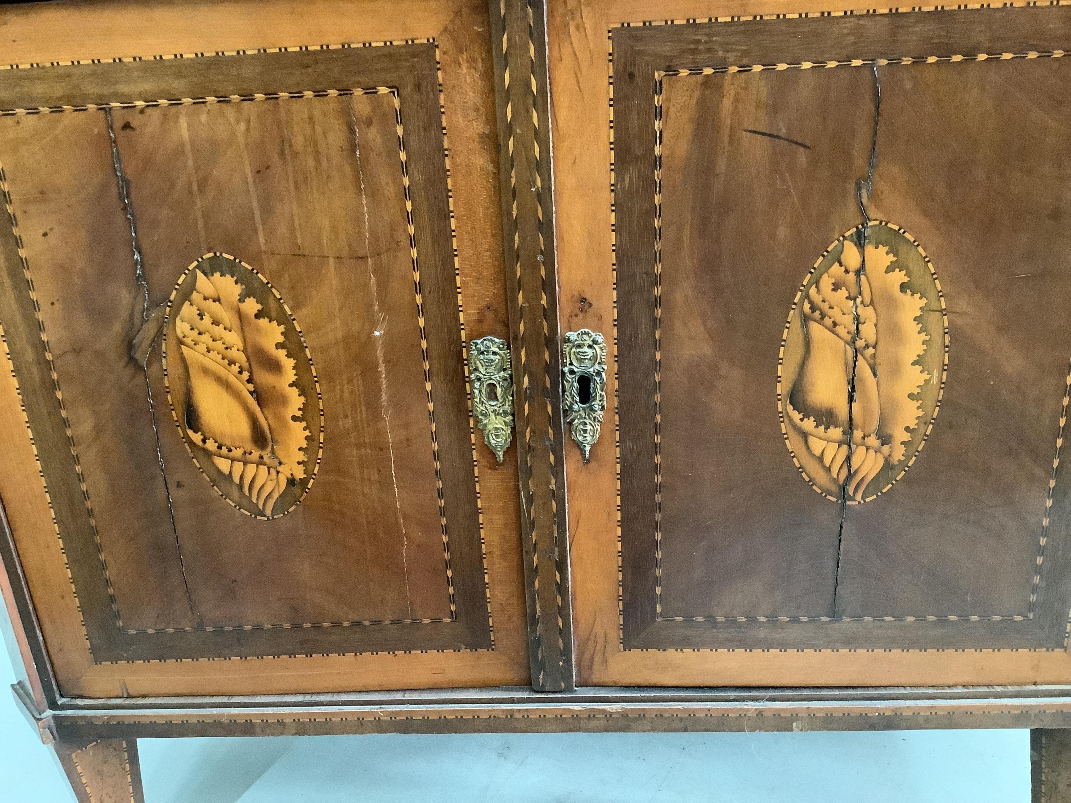 An early 19th century Dutch marquetry inlaid mahogany secretaire à abbatant, width 82cm, depth 41cm, height 143cm. Condition - fair